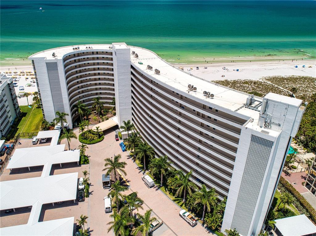 6300 Midnight Pass Road, Unit 110 Sarasota, FL 34242 - Photo 1 of 1 a view of a yard with an outdoor space