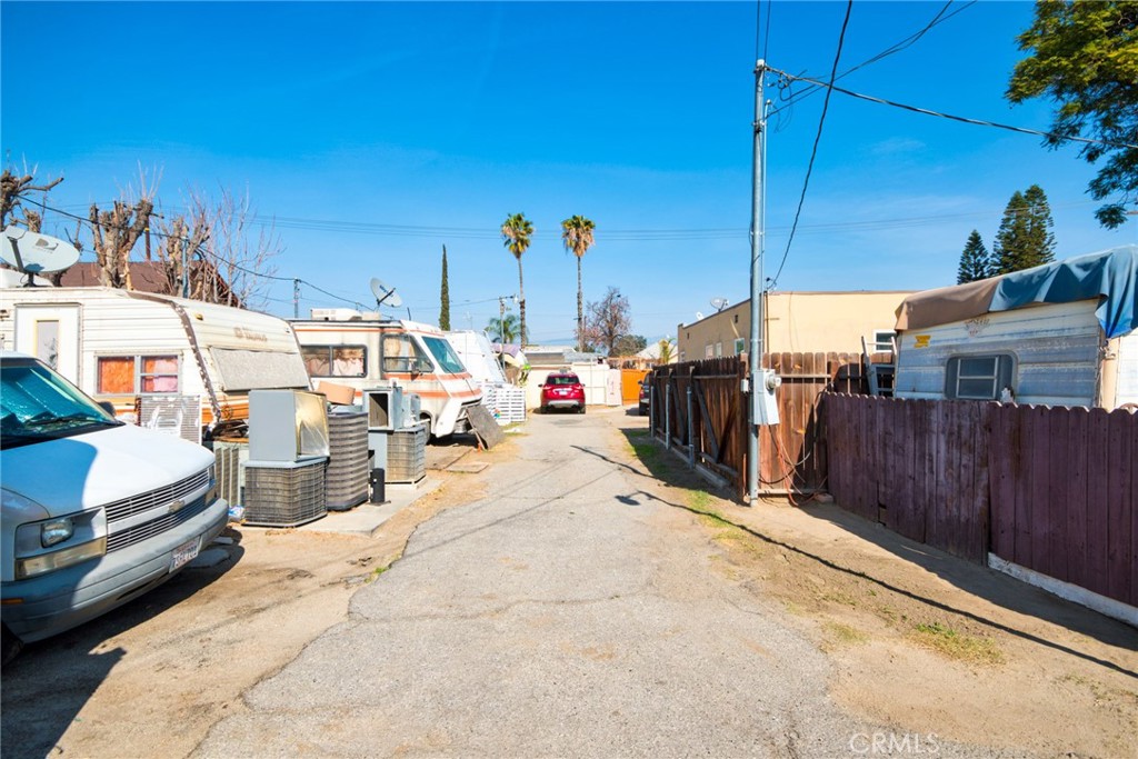584 East H Street, Unit 111 Colton, CA 92324 - Photo 18 of 18 a view of a walk in the back yard of a building