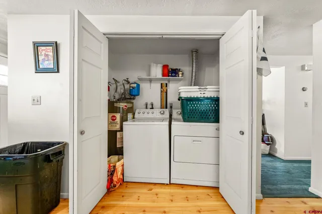 a bedroom with bed and a window