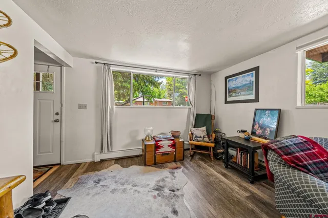 a kitchen with a refrigerator stove and microwave