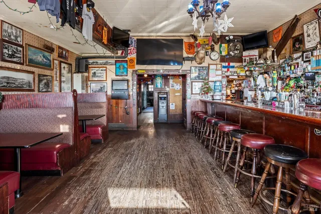 a view of dinning table and chairs