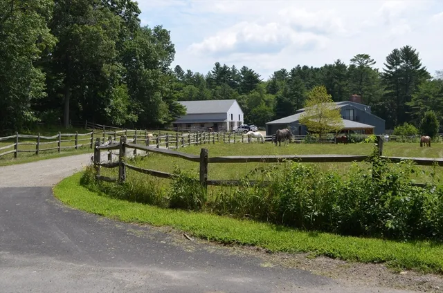 a sign that is sitting in a forest