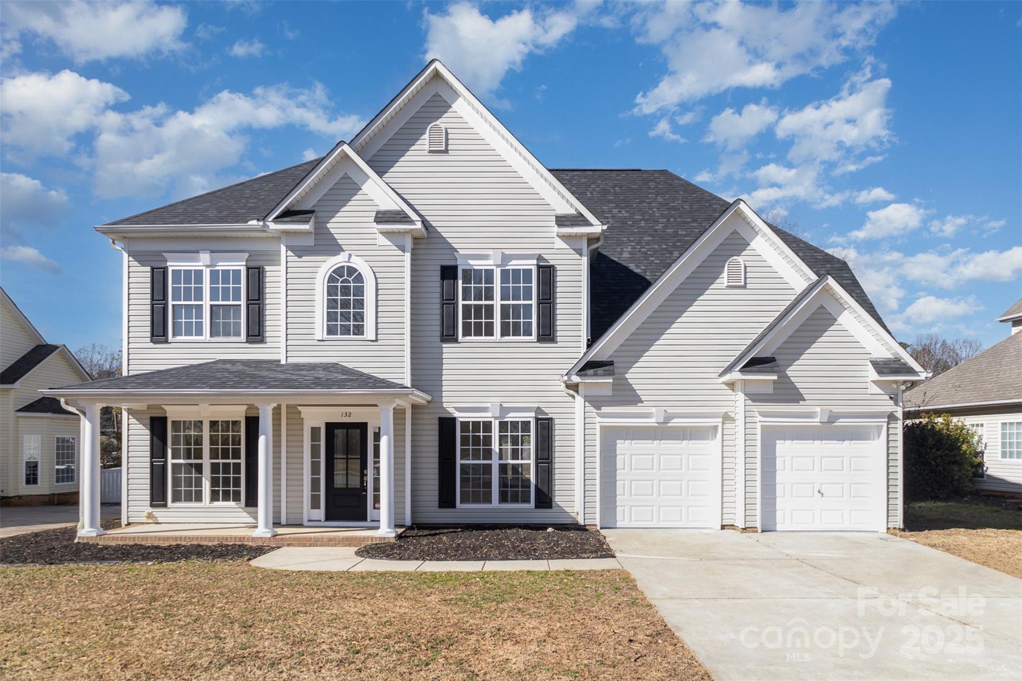 132 Elizabeth Hearth Road Mooresville, NC 28115 - Photo 1 of 40 a front view of a house with a yard