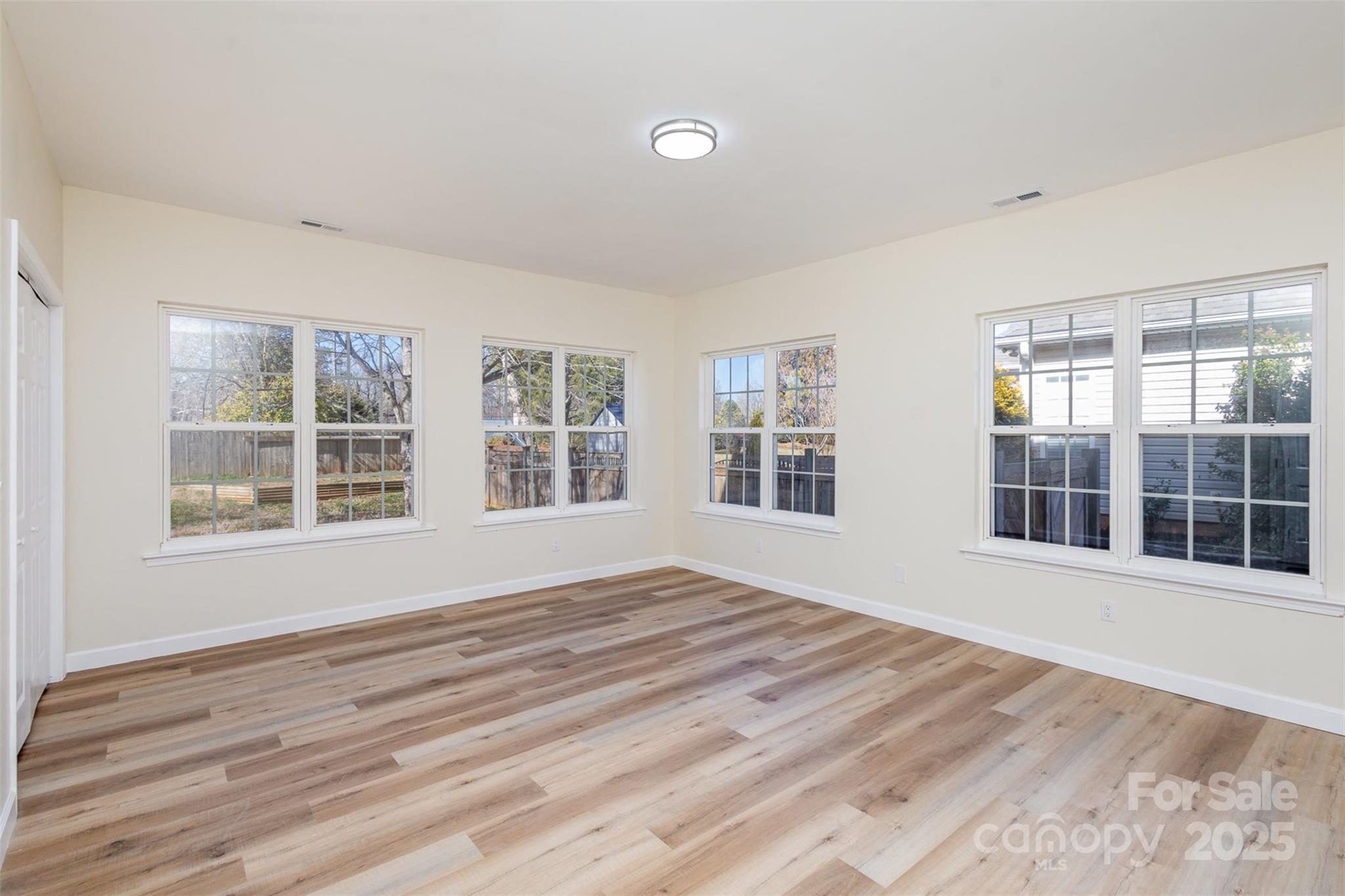 132 Elizabeth Hearth Road Mooresville, NC 28115 - Photo 18 of 40 a view of empty room with windows