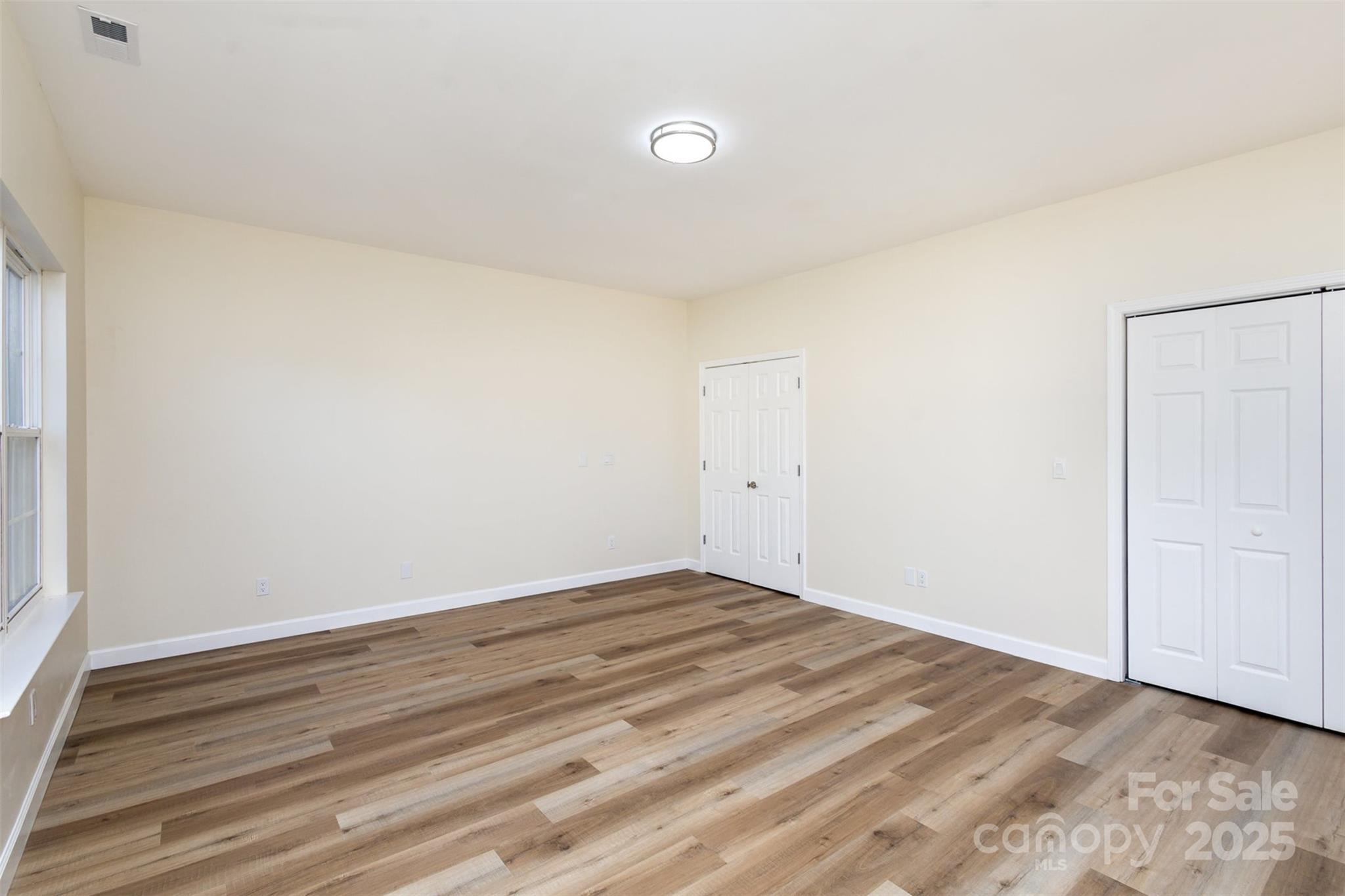 132 Elizabeth Hearth Road Mooresville, NC 28115 - Photo 19 of 40 a view of an empty room