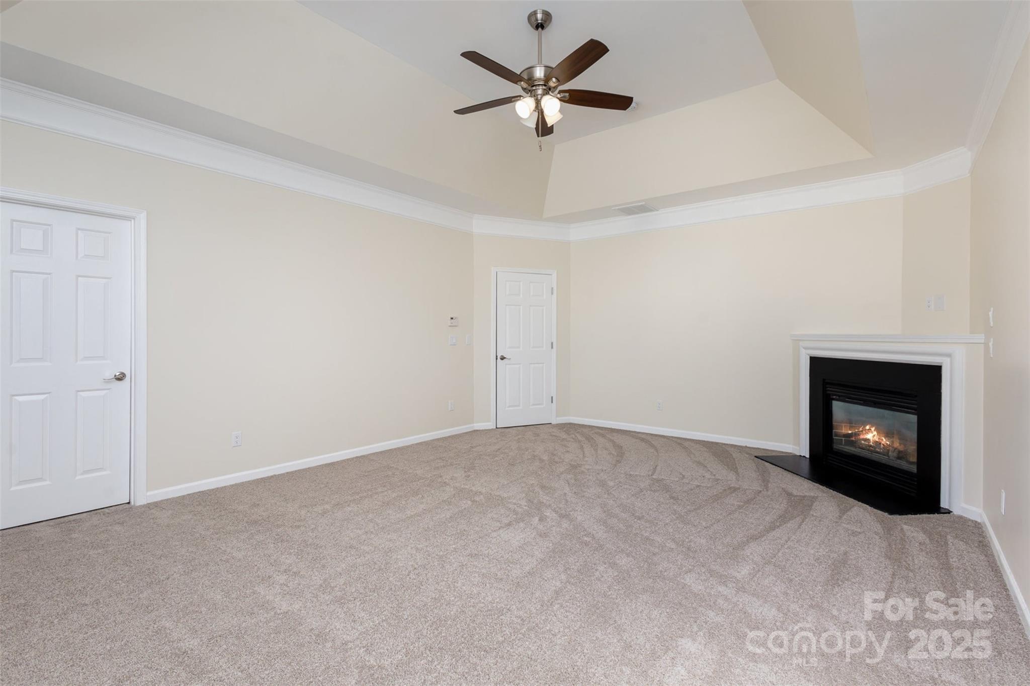 132 Elizabeth Hearth Road Mooresville, NC 28115 - Photo 23 of 40 a view of an empty room with a fireplace