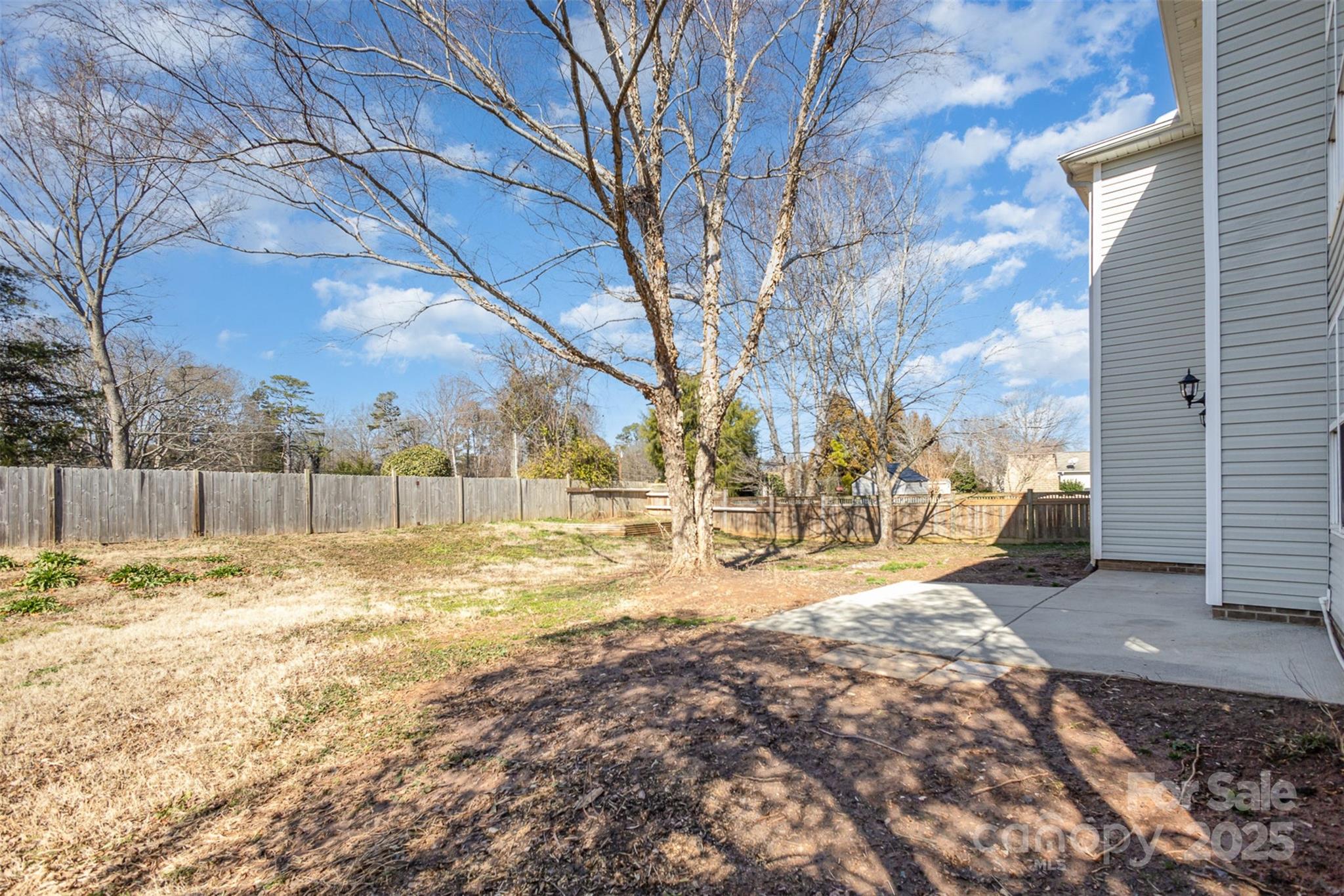 132 Elizabeth Hearth Road Mooresville, NC 28115 - Photo 36 of 40 a view of yard with wooden fence