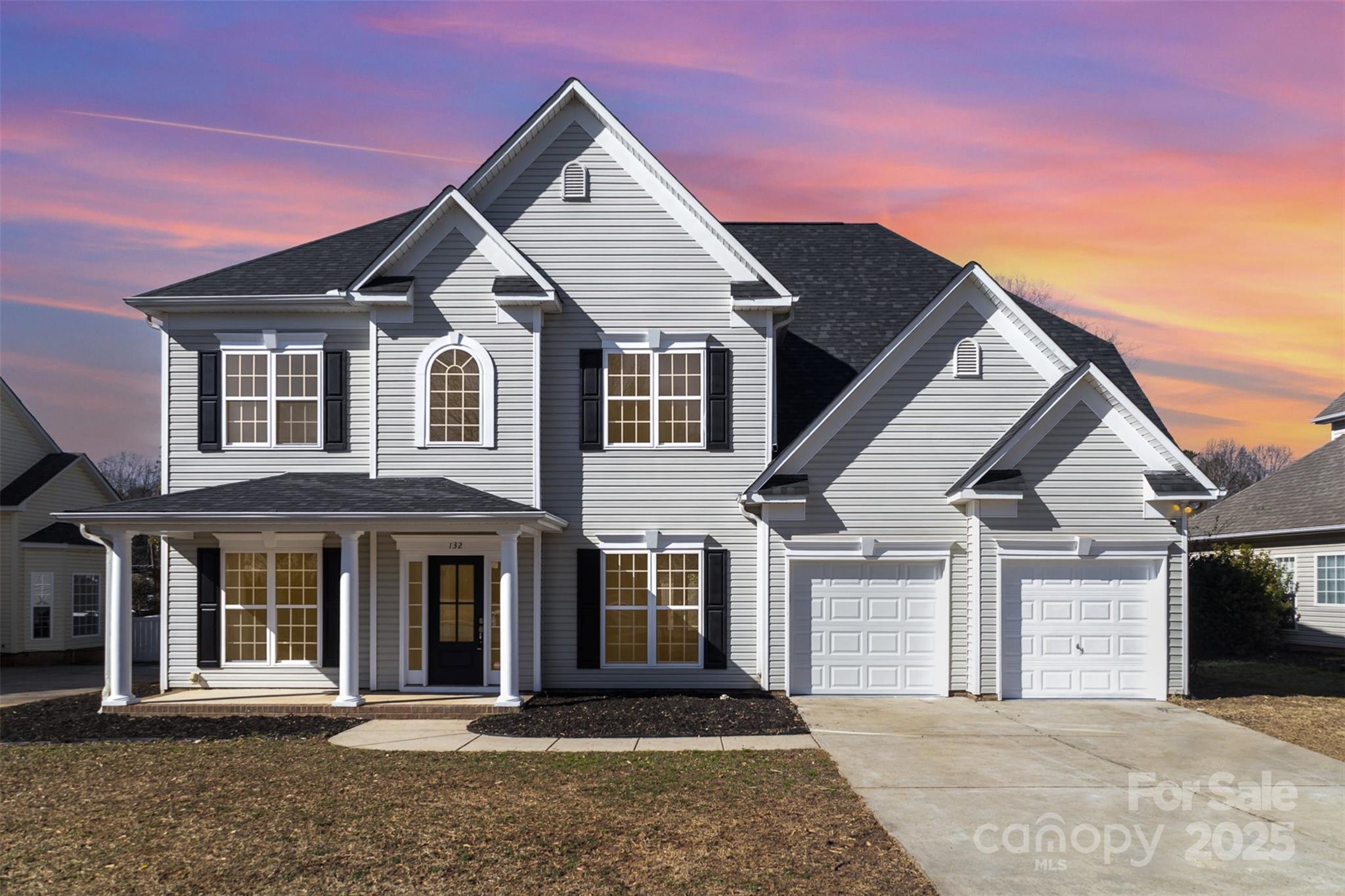 132 Elizabeth Hearth Road Mooresville, NC 28115 - Photo 4 of 40 a front view of a house with a yard