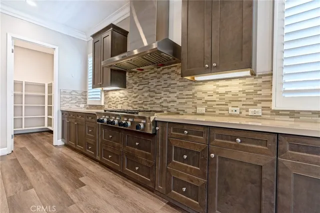 a view of a kitchen from the hallway