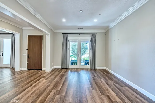 a kitchen with stainless steel appliances granite countertop a stove and a refrigerator