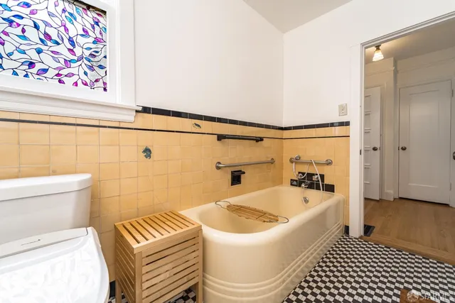 a bathroom with a sink and a bathtub
