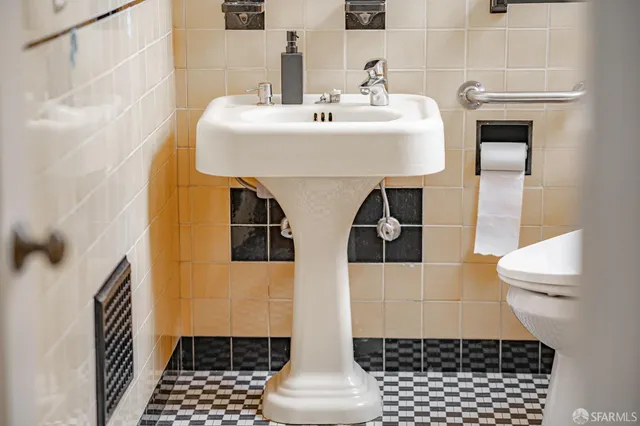a bathroom with a sink and a toilet