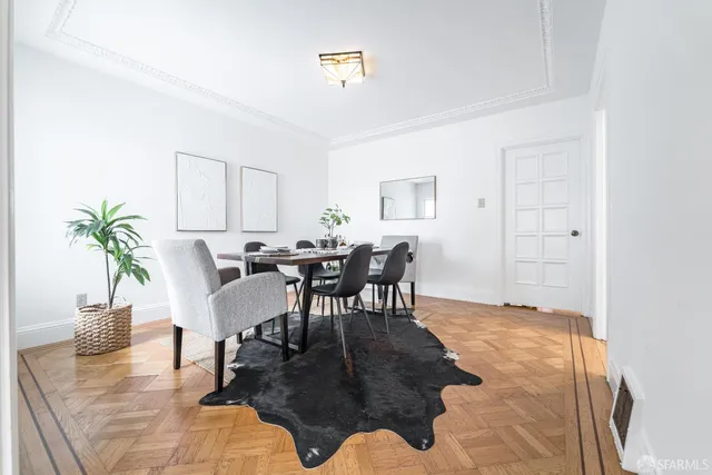 a view of a dining room with furniture