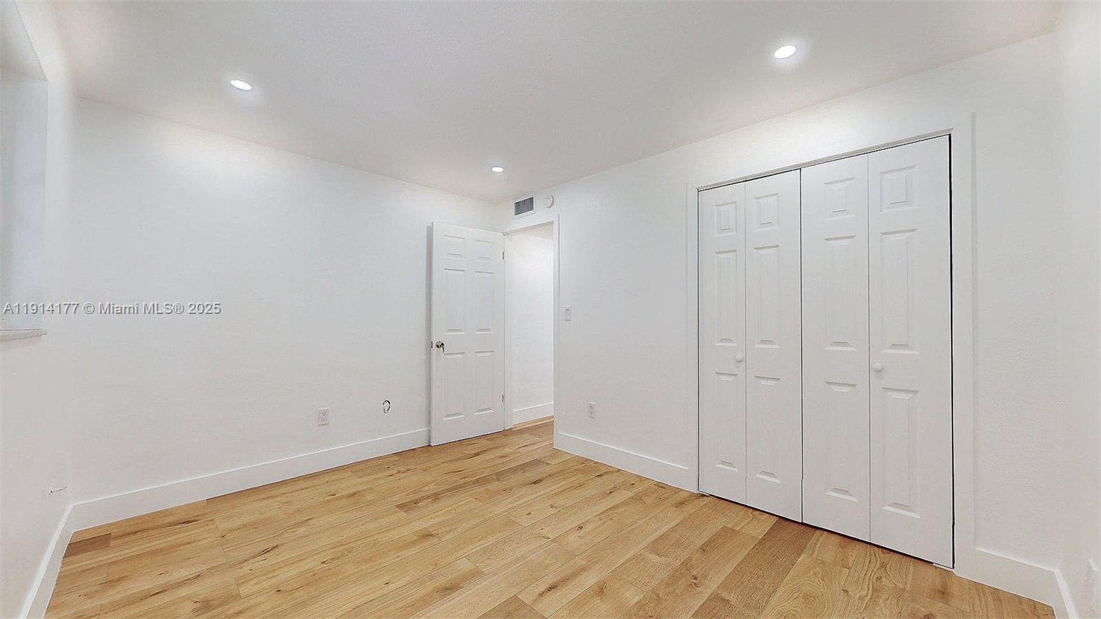 1201 Southwest 42nd Avenue, Unit 211 Miami, FL 33134 - Photo 10 of 19 a view of an empty room