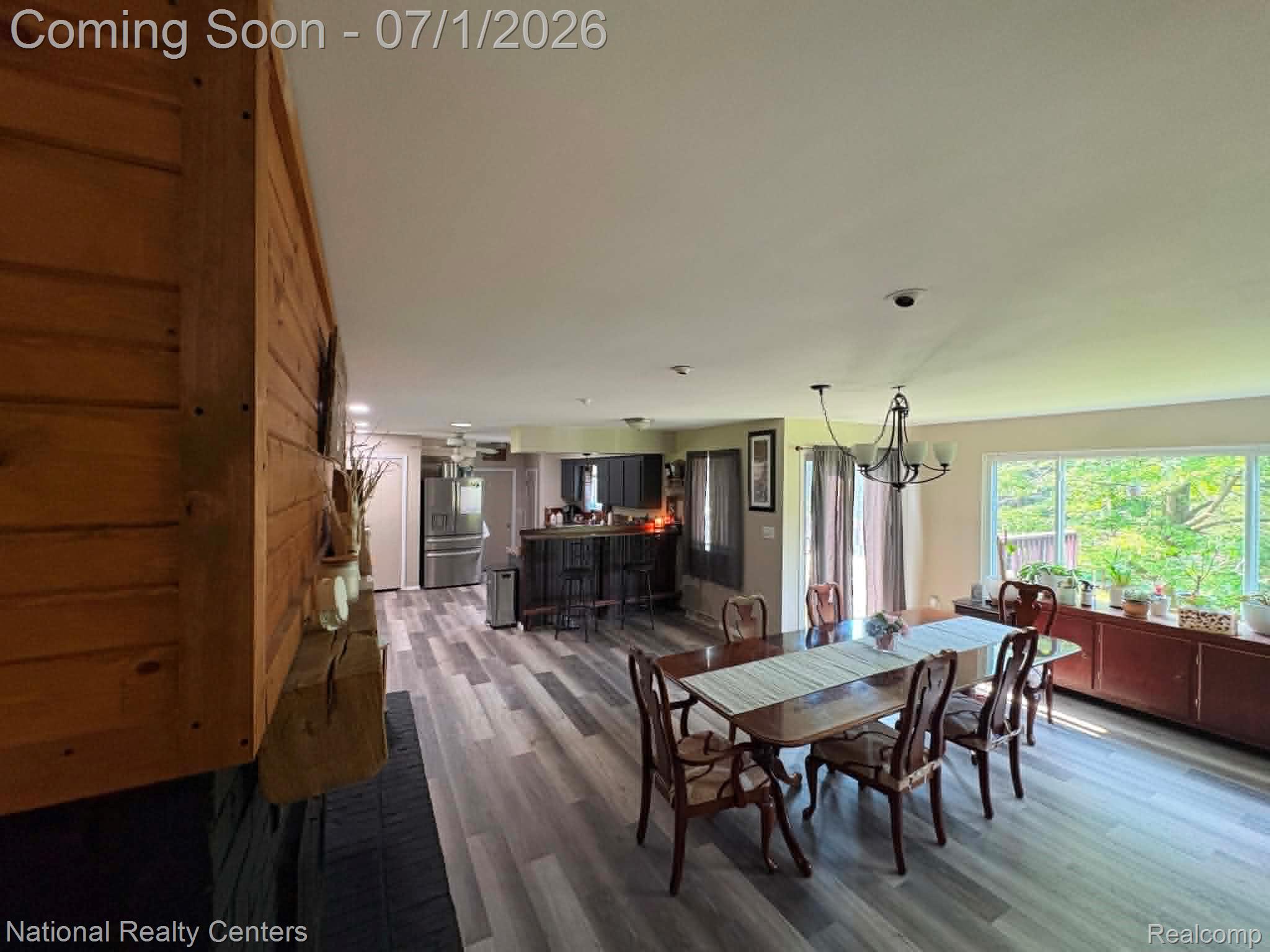 1330 Brauer Road Oxford, MI 48371 - Photo 36 of 54 Open concept living space featuring wood-finish flooring throughout