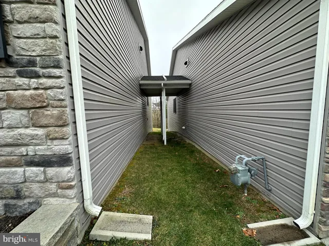 a view of a house with porch and wooden floor