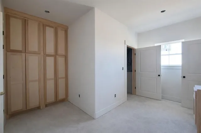 a view of an empty room with window
