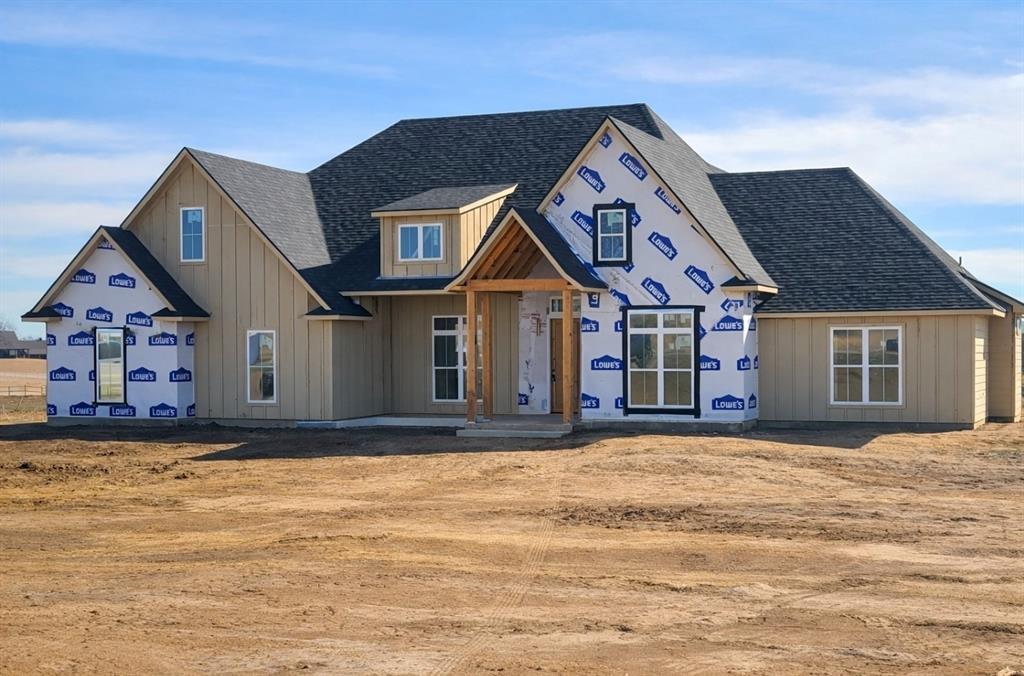 176 Vaughn Lane Calera, OK 74730 - Photo 3 of 21 a front view of a house with a yard