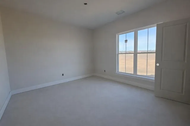 an empty room with a window