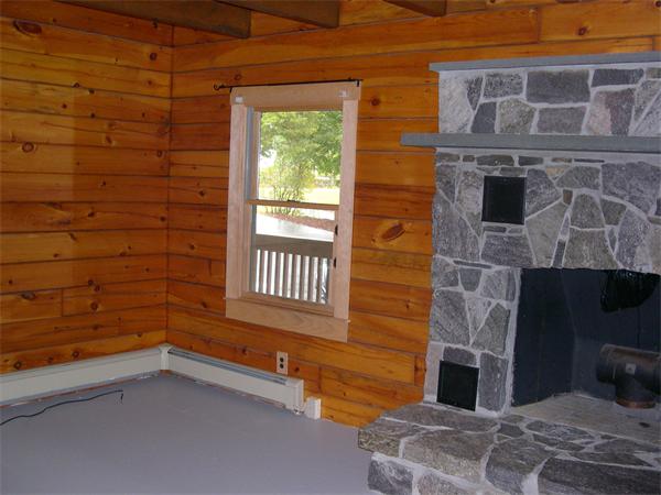 64 Bethany Road Framingham, MA 01702 - Photo 12 of 30 a room with a fireplace and wooden floor