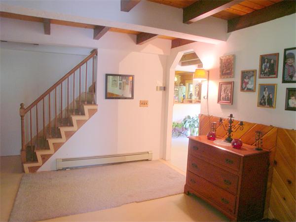 64 Bethany Road Framingham, MA 01702 - Photo 18 of 30 a view of a livingroom with furniture and staircase