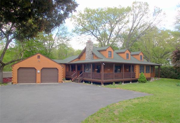 64 Bethany Road Framingham, MA 01702 - Photo 27 of 30 a front view of a house with a garden
