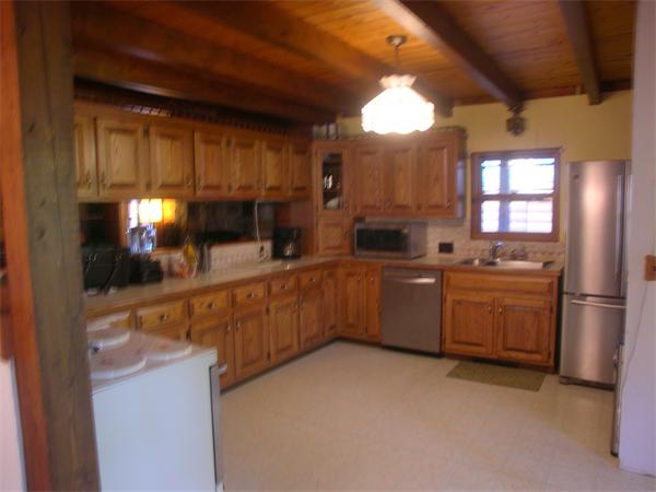 64 Bethany Road Framingham, MA 01702 - Photo 8 of 30 a kitchen with a sink cabinets and window