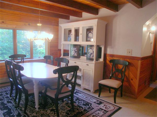 64 Bethany Road Framingham, MA 01702 - Photo 10 of 30 a view of a dining room with furniture window and outside view