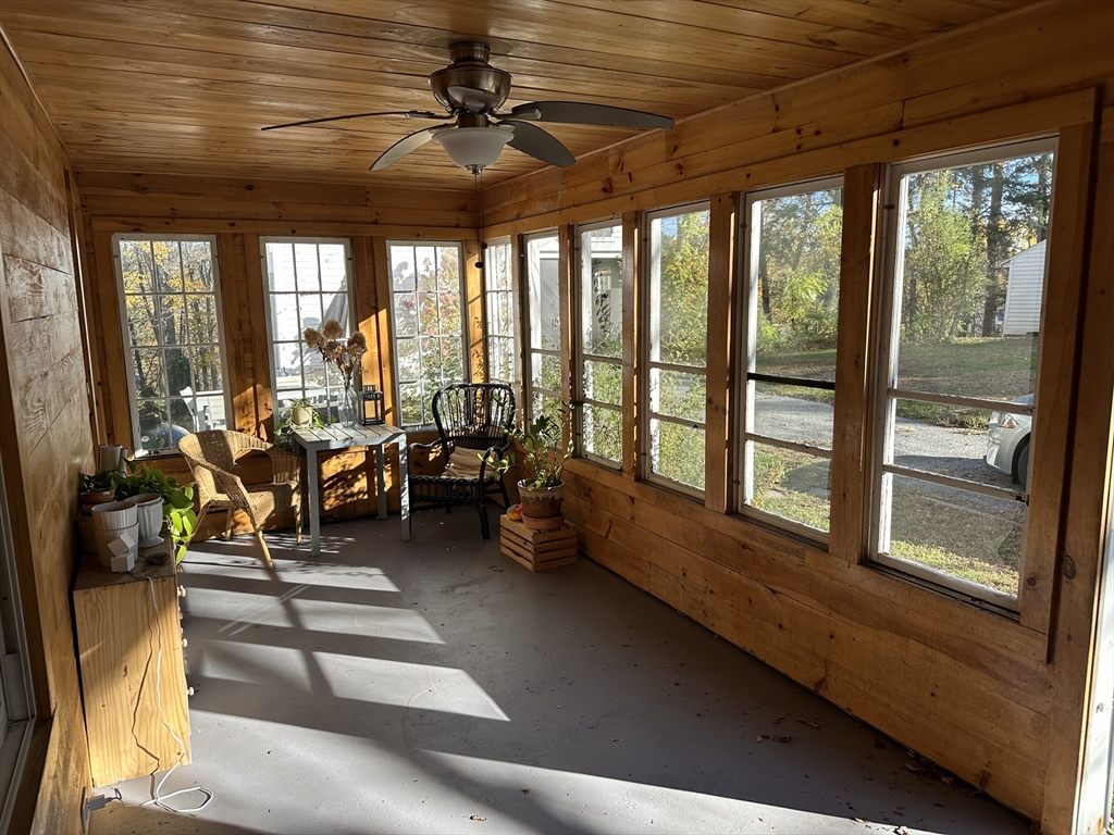 10 Maple Street Sturbridge, MA 01566 - Photo 11 of 30 a living room with furniture and a large window