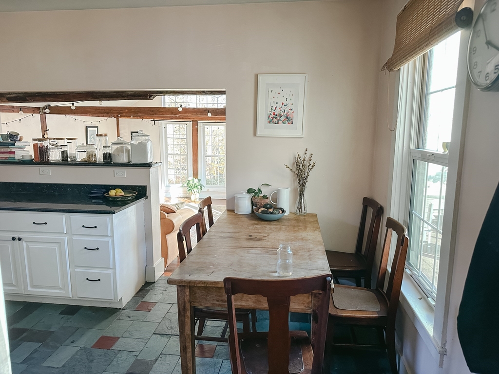 10 Maple Street Sturbridge, MA 01566 - Photo 13 of 30 a view of a dining room with furniture and wooden floor