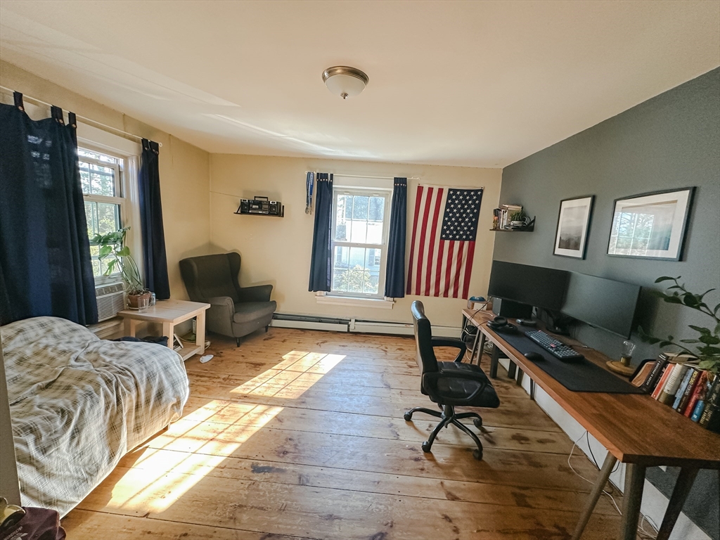 10 Maple Street Sturbridge, MA 01566 - Photo 26 of 30 a bedroom with furniture and a window