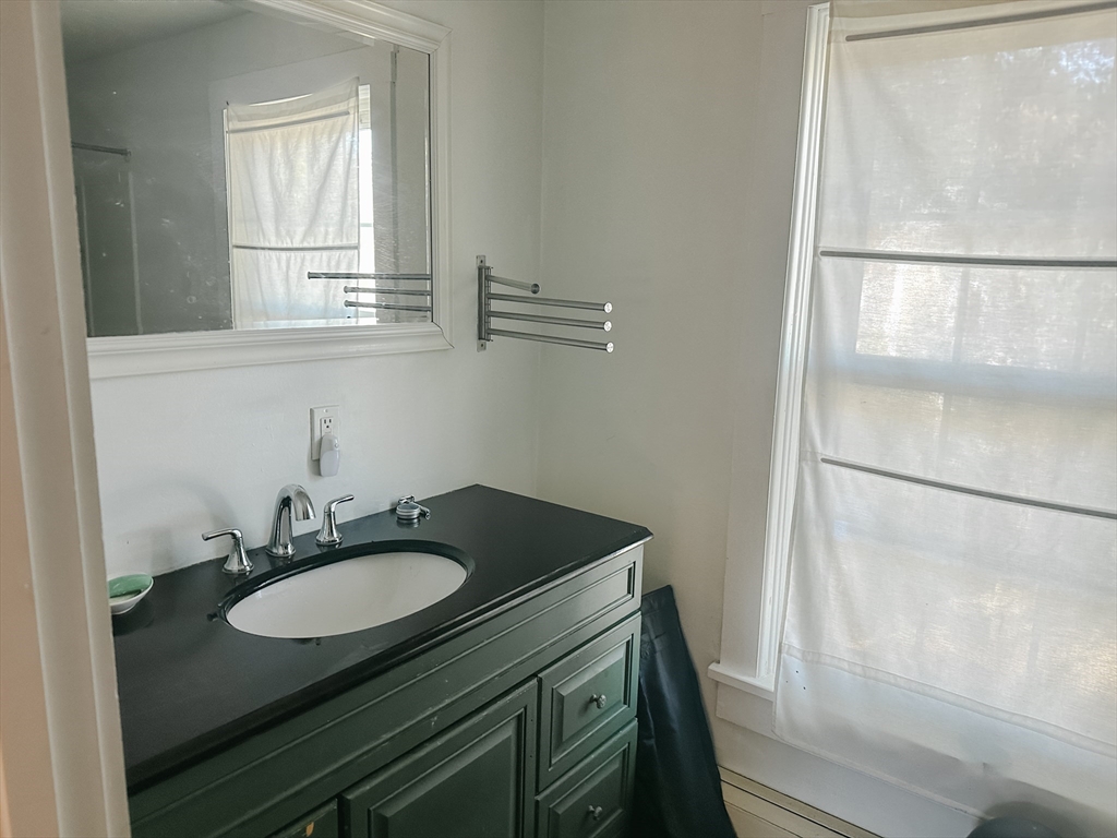 10 Maple Street Sturbridge, MA 01566 - Photo 27 of 30 a sink with a mirror