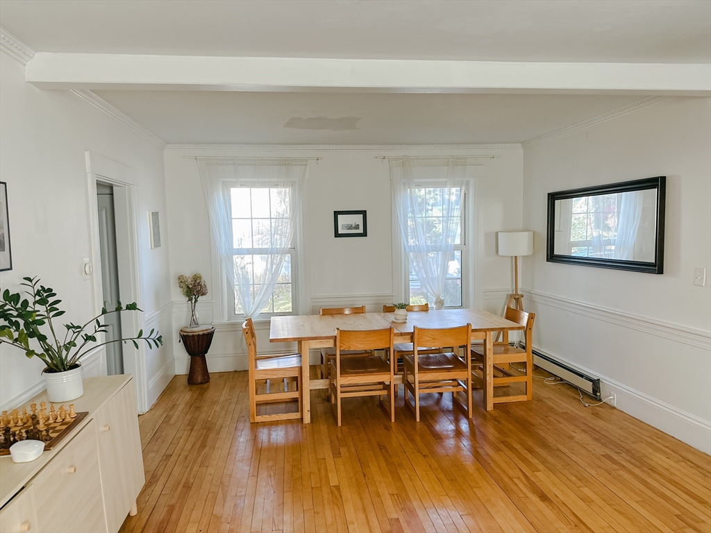 10 Maple Street Sturbridge, MA 01566 - Photo 5 of 30 a view of a dining room with furniture window and wooden floor