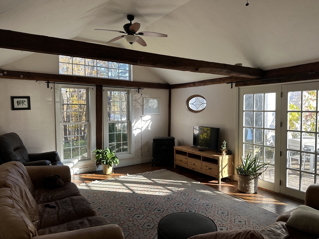 10 Maple Street Sturbridge, MA 01566 - Photo 10 of 30 a living room with furniture and windows