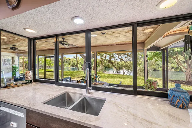 a view of a swimming pool with a patio