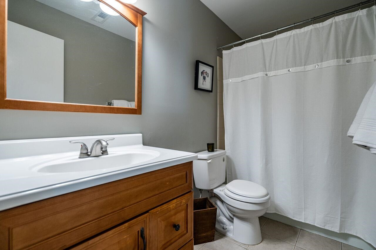 1500 Windbur Place Raleigh, NC 27609 - Photo 15 of 30 Upstairs Hall Bath