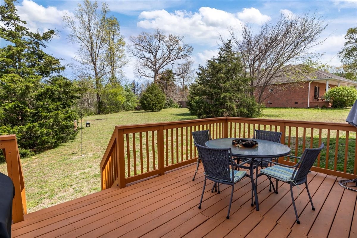 10011 Wendy Way Lyles, TN 37098 - Photo 16 of 51 a view of a two chairs and table on the wooden deck