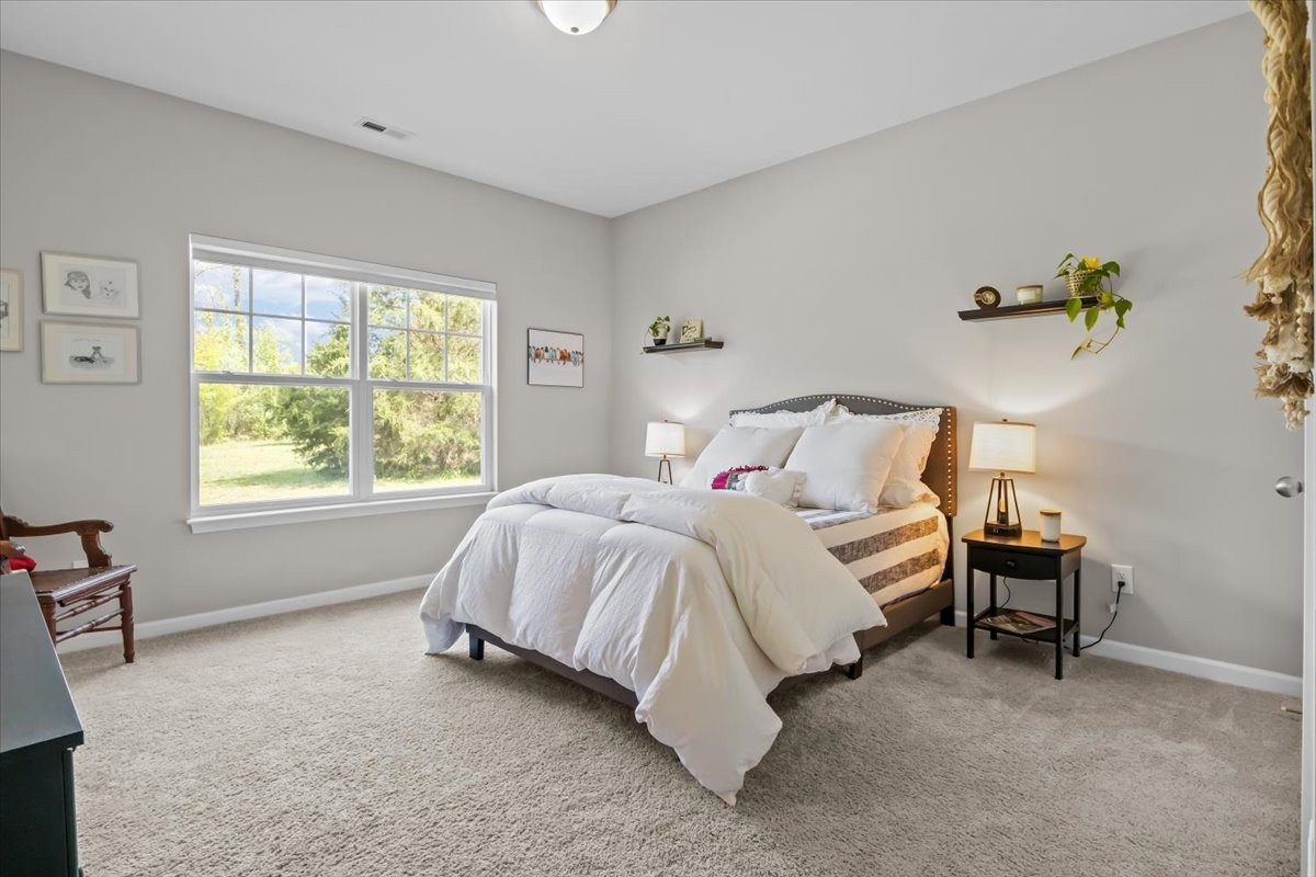 10011 Wendy Way Lyles, TN 37098 - Photo 17 of 51 a bedroom with a bed chair and a window