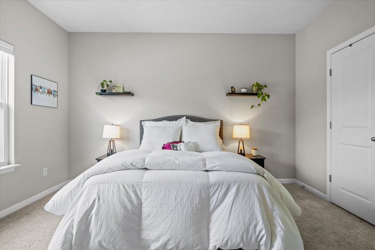 10011 Wendy Way Lyles, TN 37098 - Photo 20 of 51 a bedroom with a bed and painting on the wall