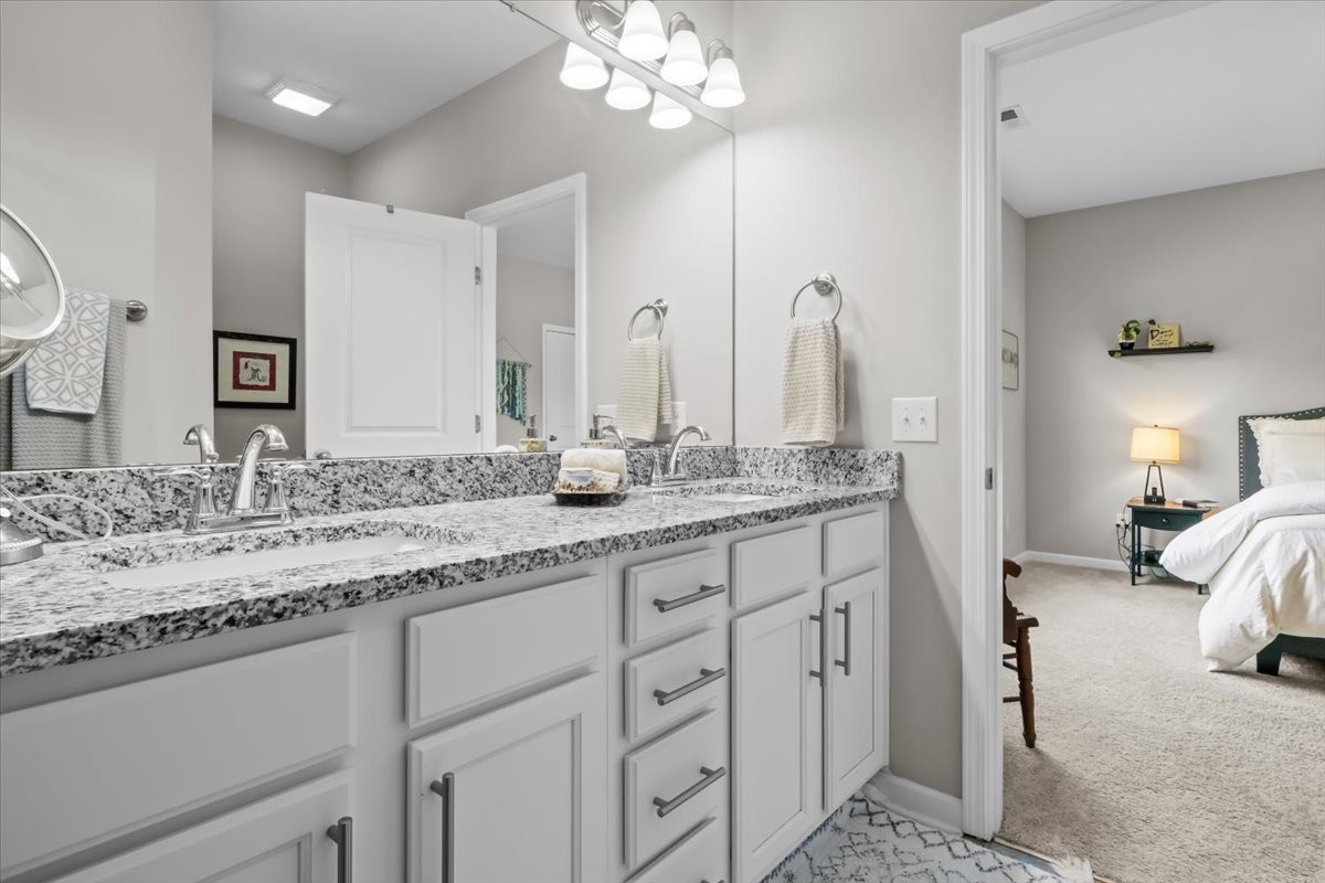 10011 Wendy Way Lyles, TN 37098 - Photo 21 of 51 a bathroom with a granite countertop sink two mirror and a large mirror