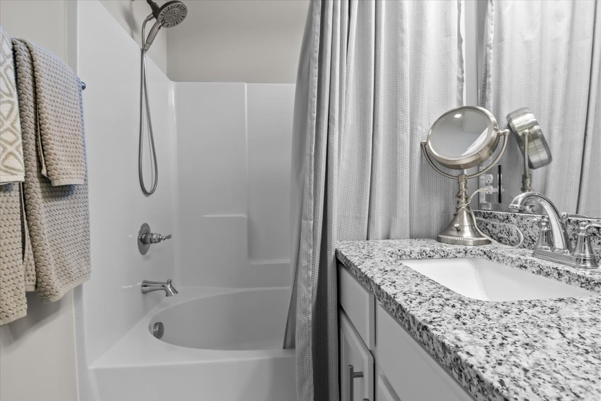 10011 Wendy Way Lyles, TN 37098 - Photo 22 of 51 a bathroom with a granite countertop sink and a mirror
