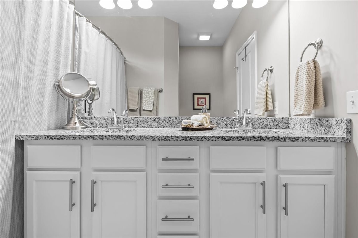 10011 Wendy Way Lyles, TN 37098 - Photo 23 of 51 a bathroom with a sink and a mirror