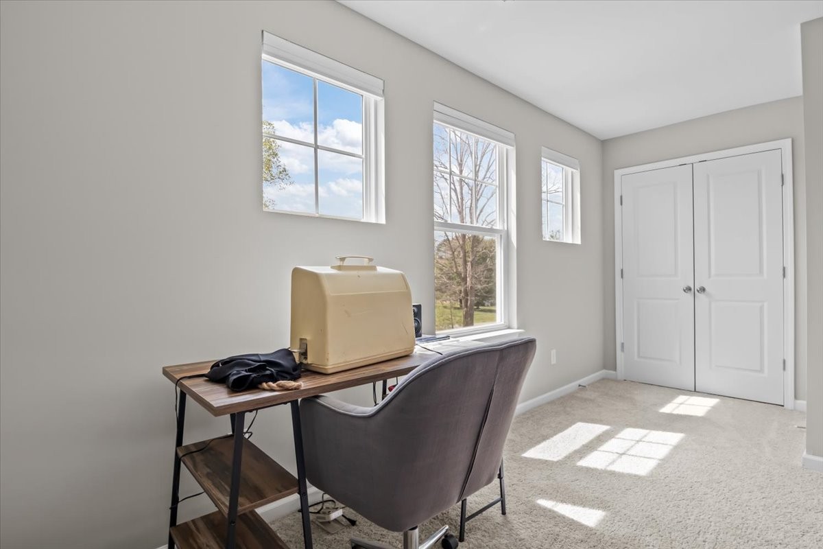 10011 Wendy Way Lyles, TN 37098 - Photo 30 of 51 a view of a workspace with furniture and a window