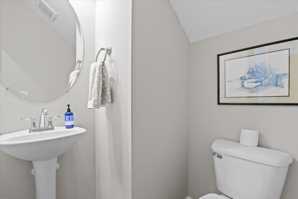 10011 Wendy Way Lyles, TN 37098 - Photo 35 of 51 a bathroom with a toilet sink and mirror