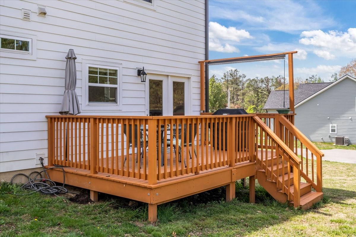 10011 Wendy Way Lyles, TN 37098 - Photo 38 of 51 a view of a wooden deck with a yard