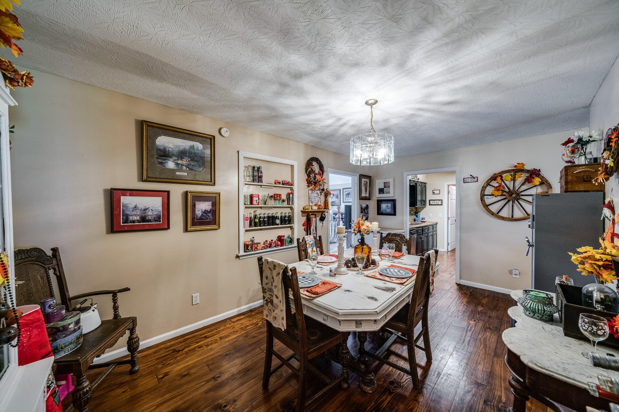 1556 Bicknell Road Clarkrange, TN 38553 - Photo 15 of 40 a view of a dining room with furniture and wooden floor