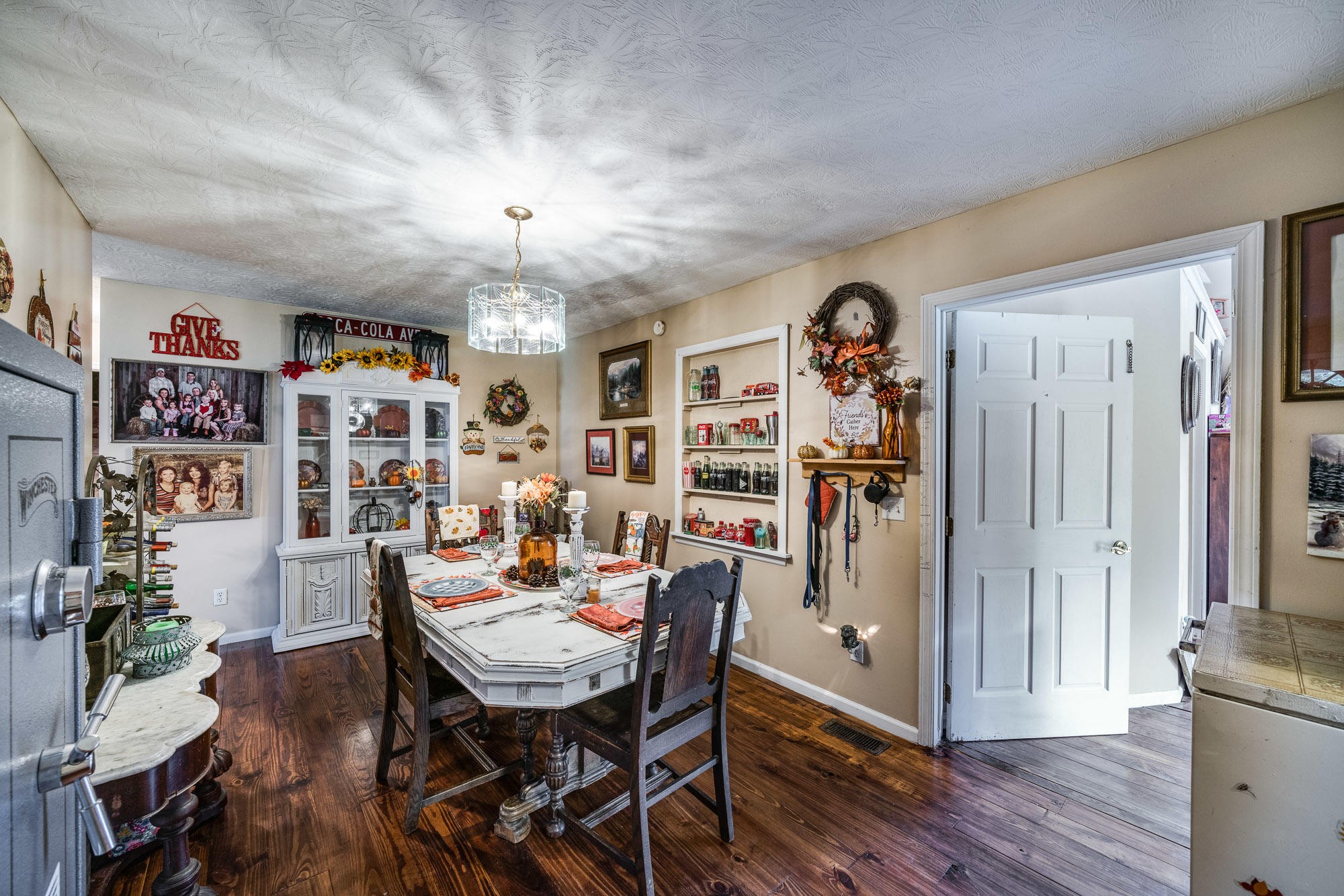 1556 Bicknell Road Clarkrange, TN 38553 - Photo 16 of 40 a view of a dining room with furniture and wooden floor