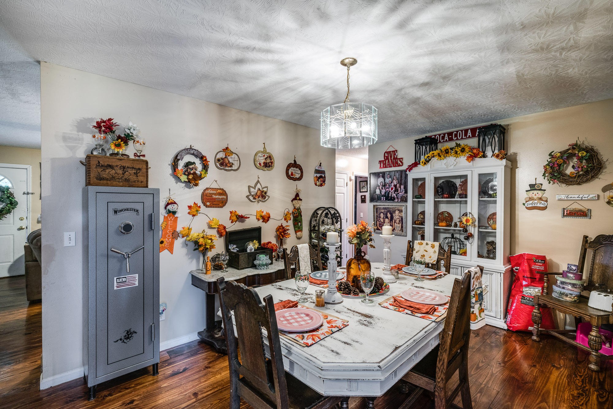 1556 Bicknell Road Clarkrange, TN 38553 - Photo 17 of 40 a view of a dining room with furniture and wooden floor