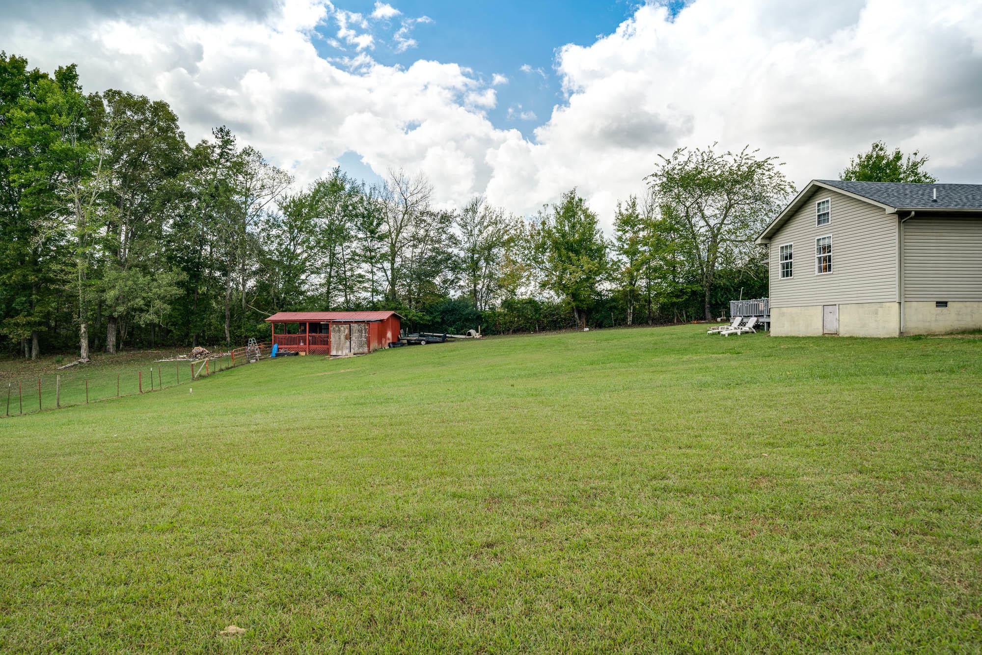 1556 Bicknell Road Clarkrange, TN 38553 - Photo 28 of 40 a view of a house with backyard
