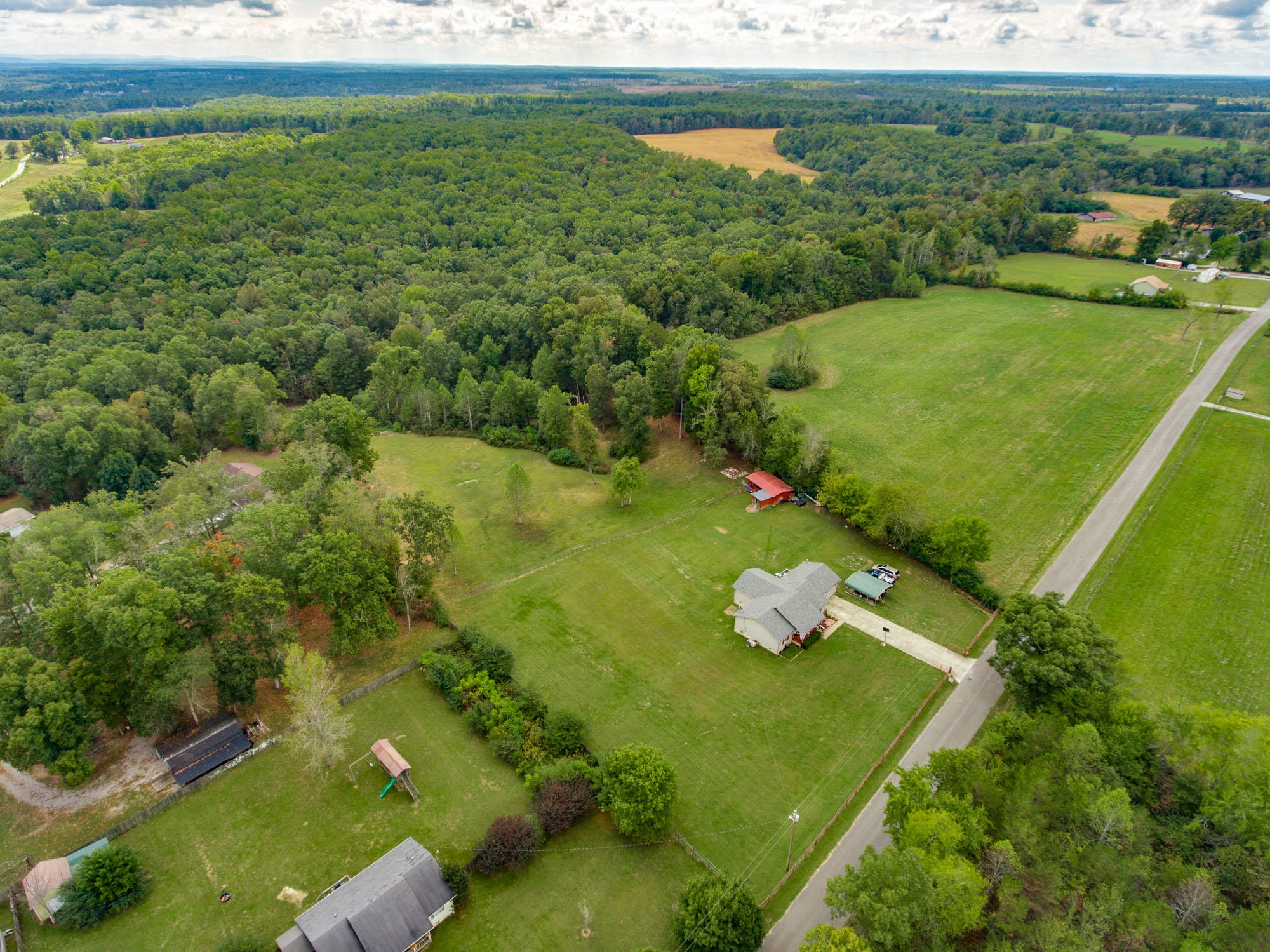1556 Bicknell Road Clarkrange, TN 38553 - Photo 3 of 40 a green field with lots of green space